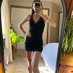 Free people little black dress
Lace detailing 
Open back with bow